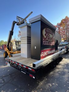 NH Signs - business sign on flatbed truck, ready for installation